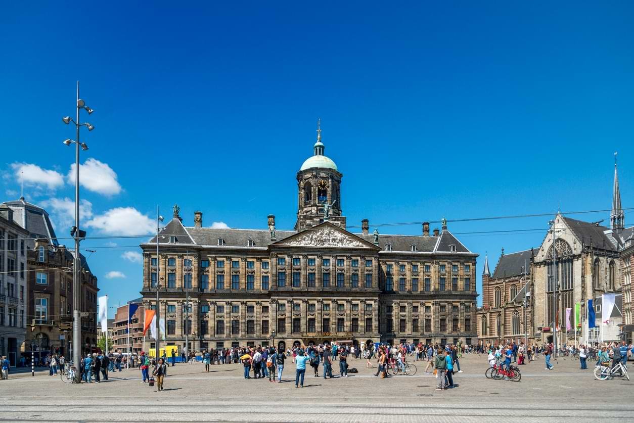 Palace Dam Square surrounded by people Heart of  Amsterdam