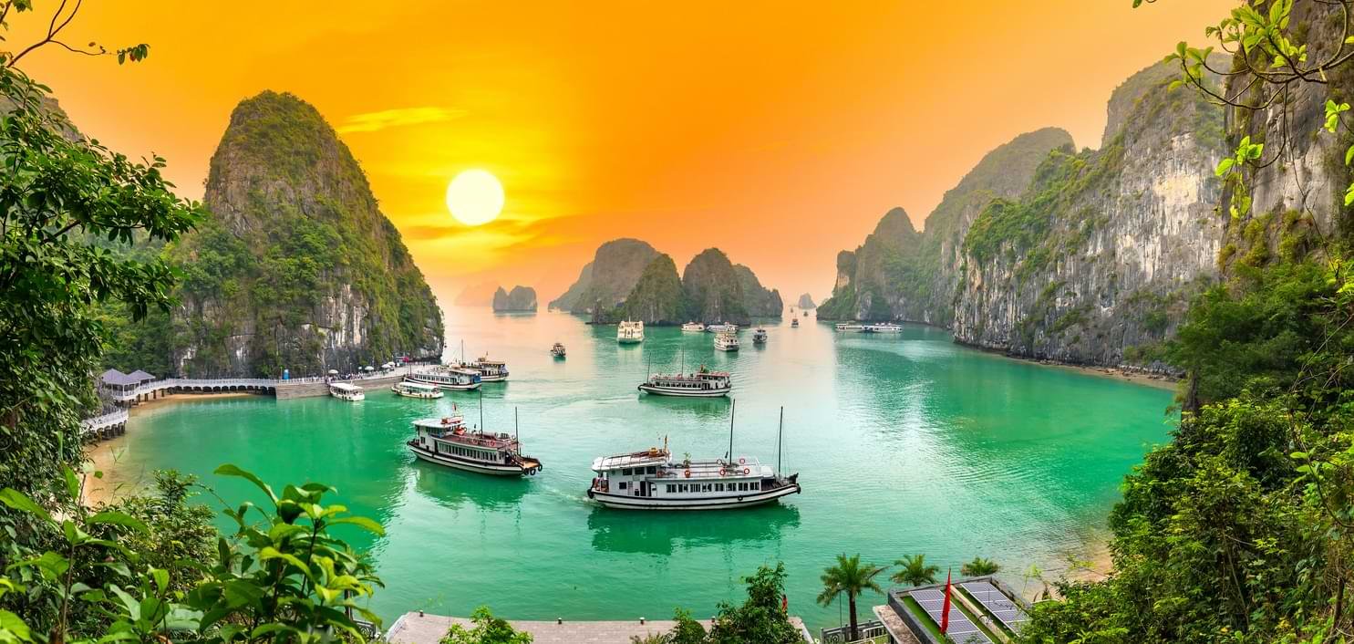 Dreamy sunset landscape Halong Bay Vietnam view from adove. This is the UNESCO World Heritage Site a beautiful natural wonder in northern Vietnam 1290787858 1 Dawkco Travels