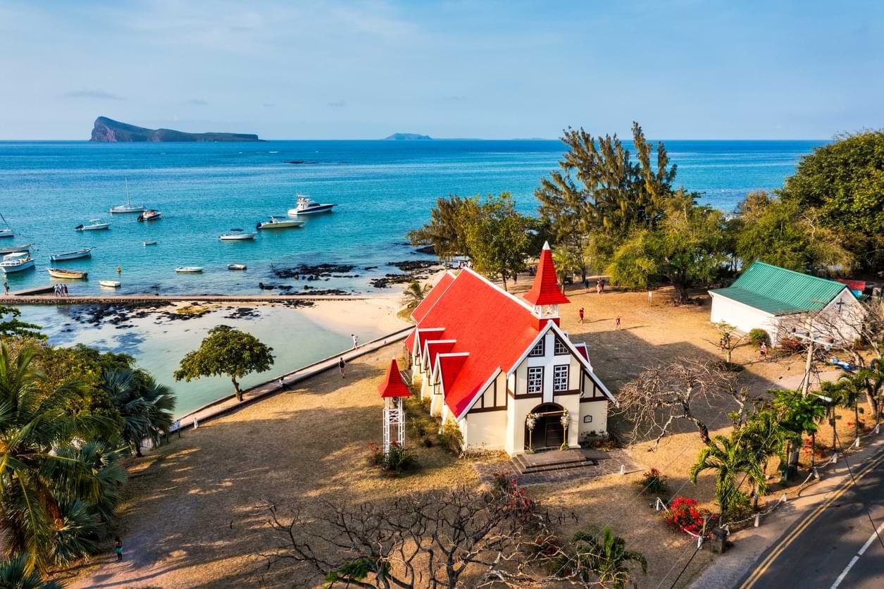 A Building with Red Roof - A Church
Red church at Cap Malheureux village, Mauritius Island. Notre Dame de Auxiliatrice, rural church with red roof in Cap Malheureux tropical village on Mauritius island, Indian Ocean. Licensed by IStocks