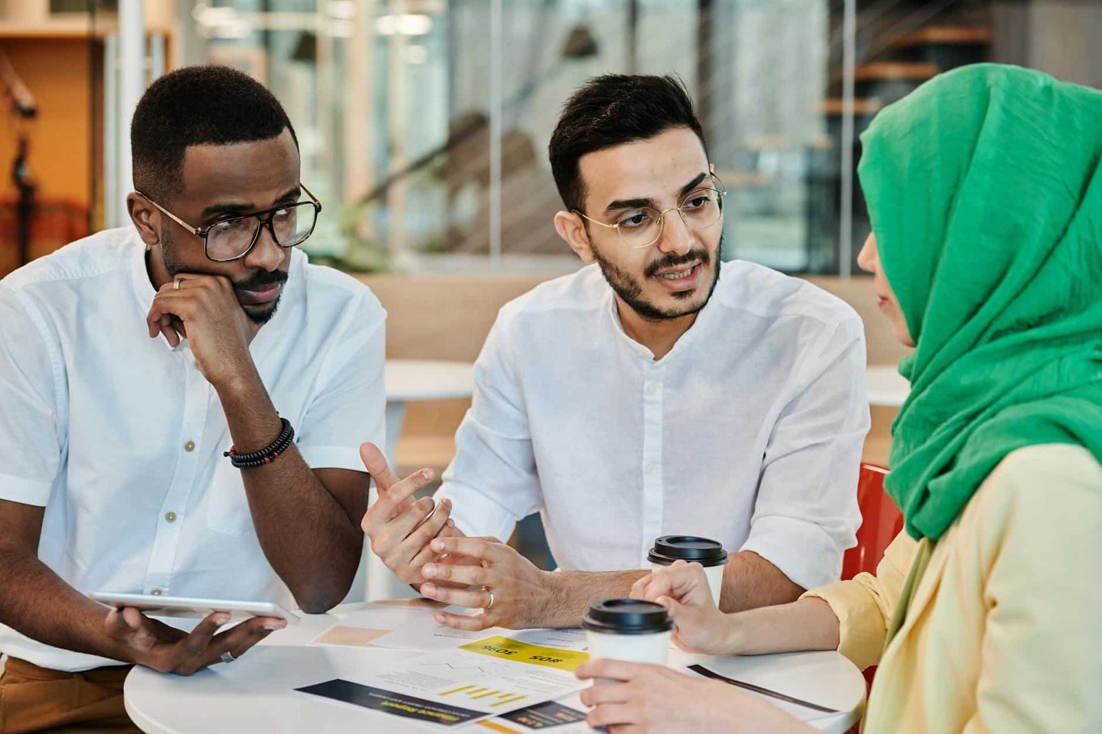 https://www.pexels.com/photo/people-talking-together-8067744/