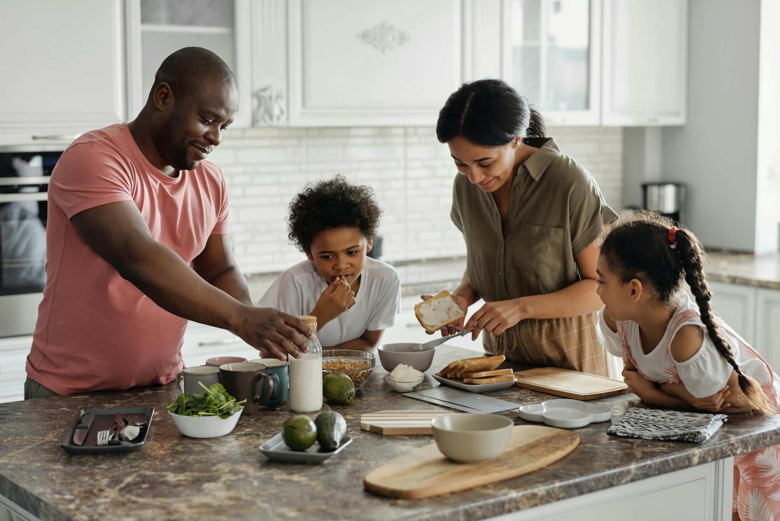 https://www.pexels.com/photo/family-making-breakfast-in-the-kitchen-4259140/